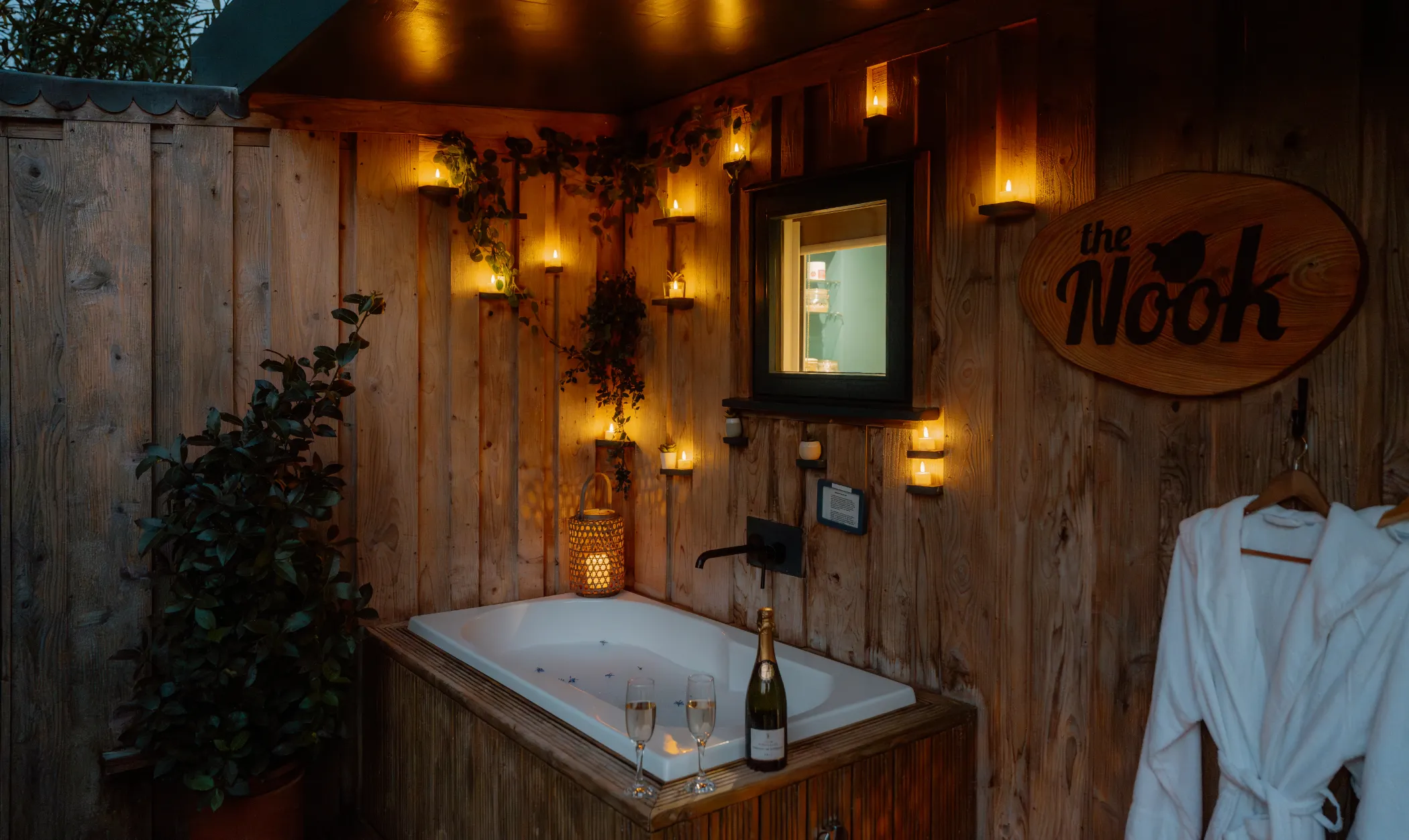 Veranda at dusk at The Roost Luxury Cabins